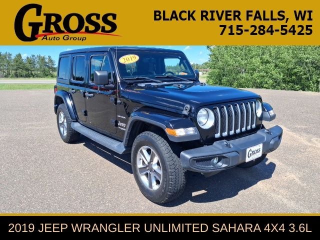 2019 Jeep Wrangler Unlimited Unlimited Sahara in Black Clearcoat — front three-quarter view