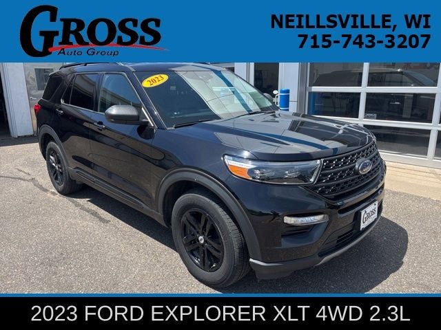 2023 Ford Explorer XLT in Black Metallic — front three-quarter view