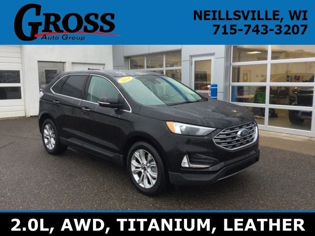 2024 Ford Edge Titanium in Black Metallic — front three-quarter view